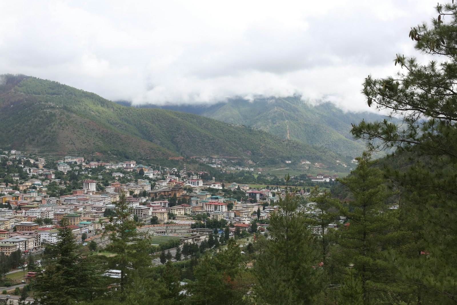 Thimphu spread along its valley floor, where the telecom offices and phone shops are