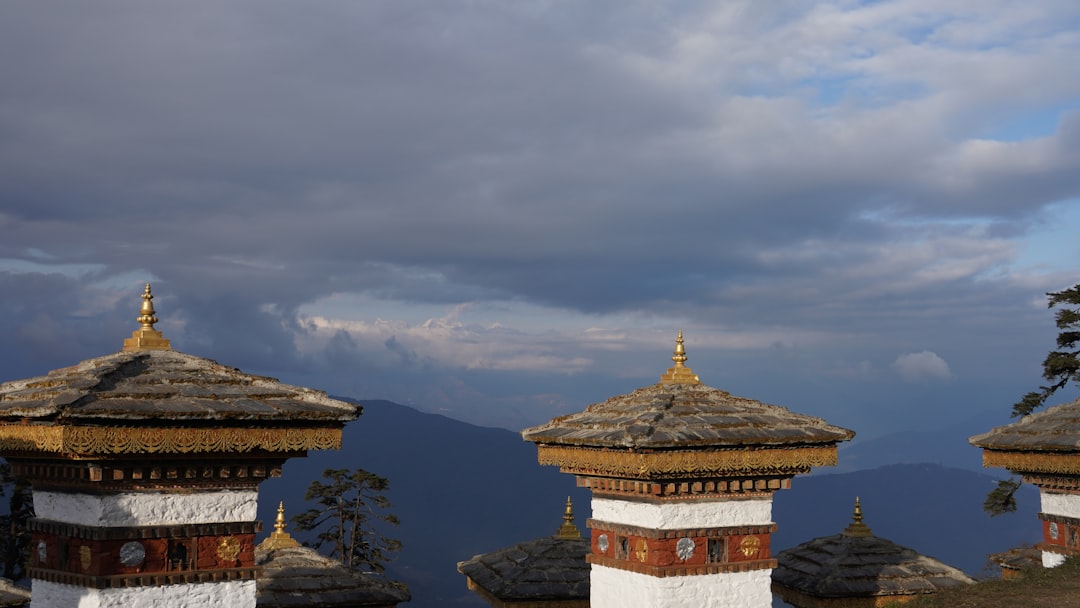 Chortens on a high Bhutanese pass under cloud