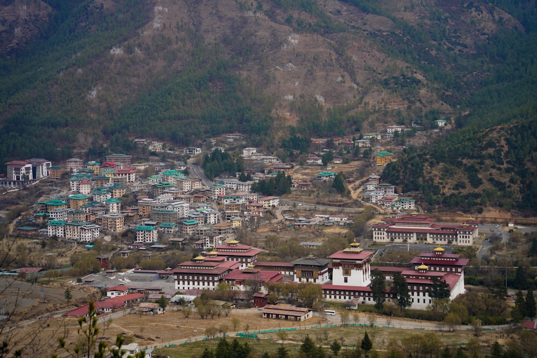 A Bhutanese valley town beneath the dzong and the ridges