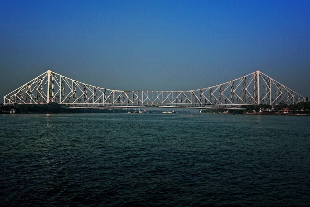 The Howrah Bridge spanning the Hooghly river at dusk