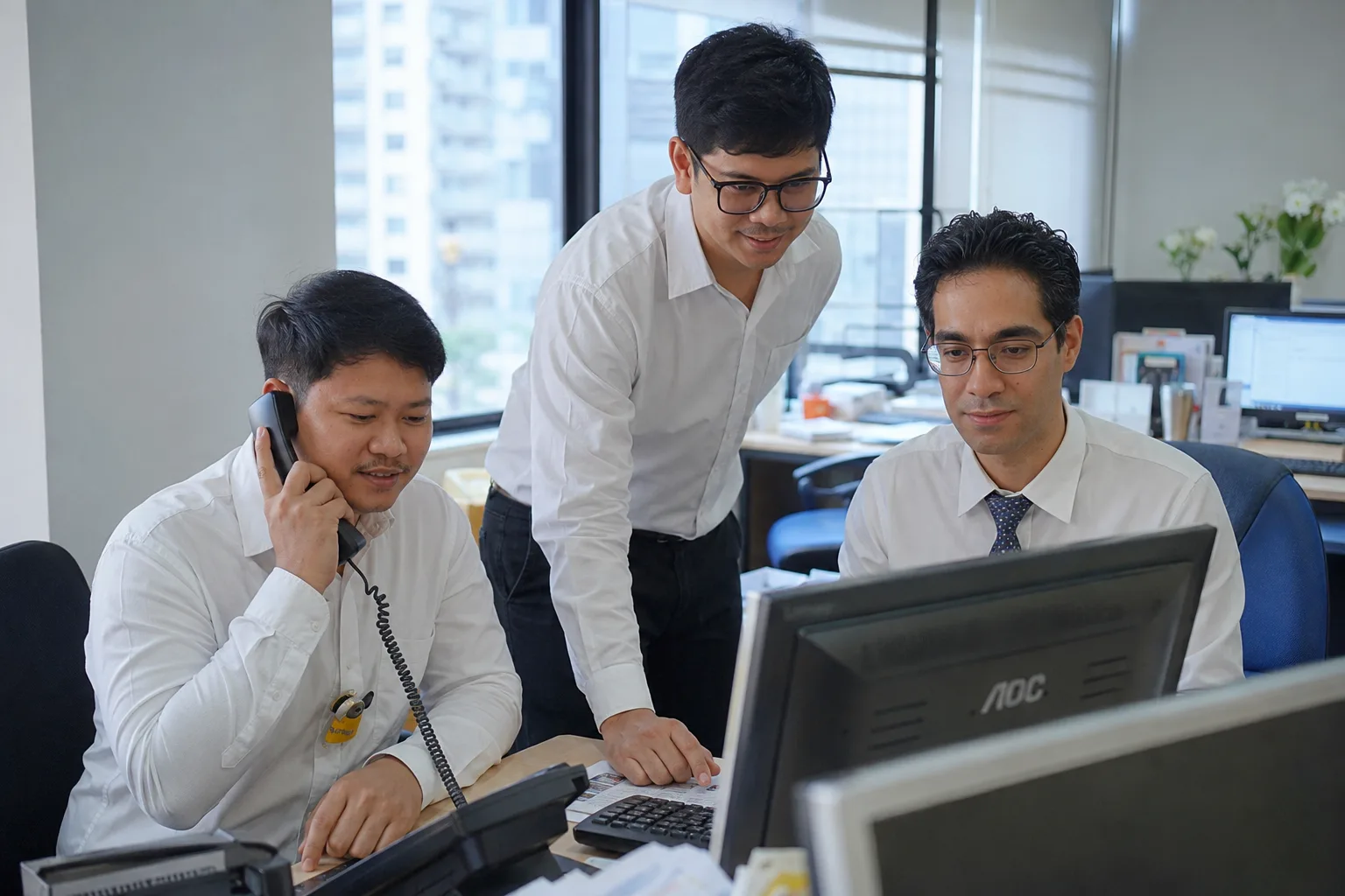 The OMG Experience local team at work in their Bangkok office